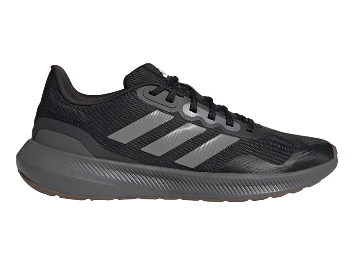 Tenis deportivos Adidas Runfalcon 3.0 color negro con franjas y suela en color gris.