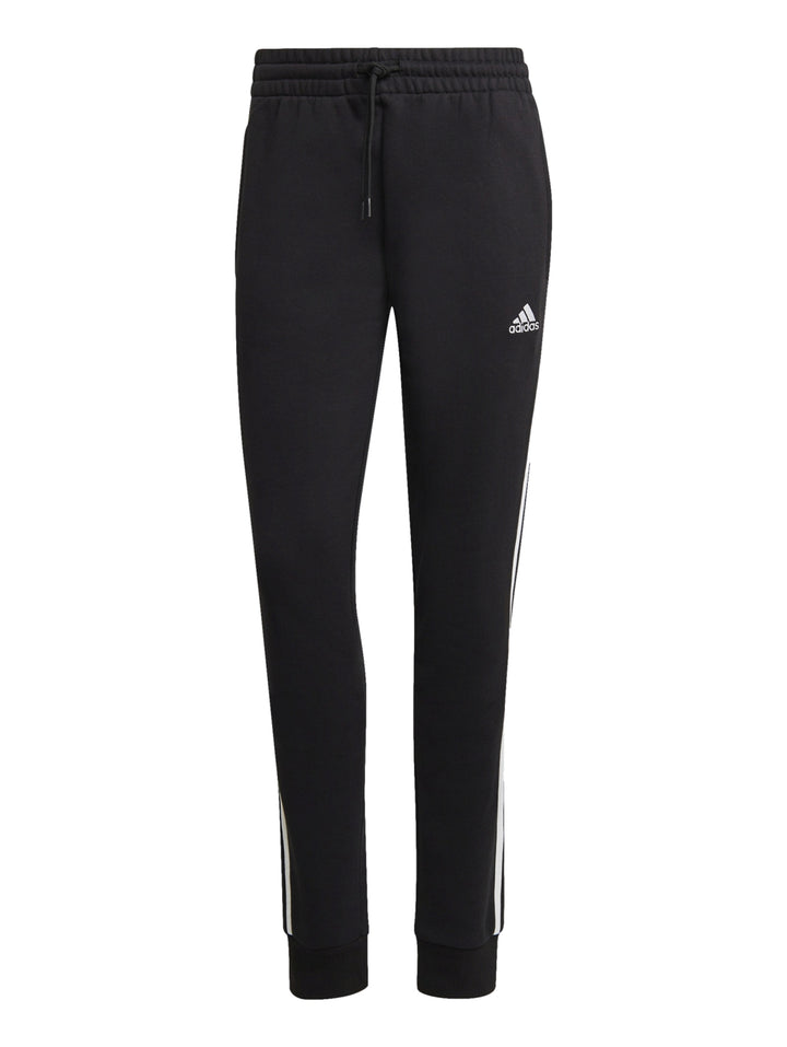 Pantalones deportivos Adidas color negro con tres franjas blancas laterales y logotipo blanco en la pierna.