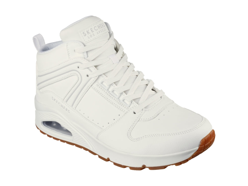 Tenis Skechers blancos de cuello alto con suela color café y cámara de aire visible en el talón.