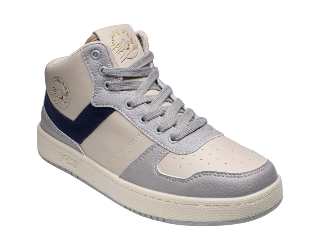 Tenis PONY City Wings Mid color beige con detalle en azul marino y suela blanca.