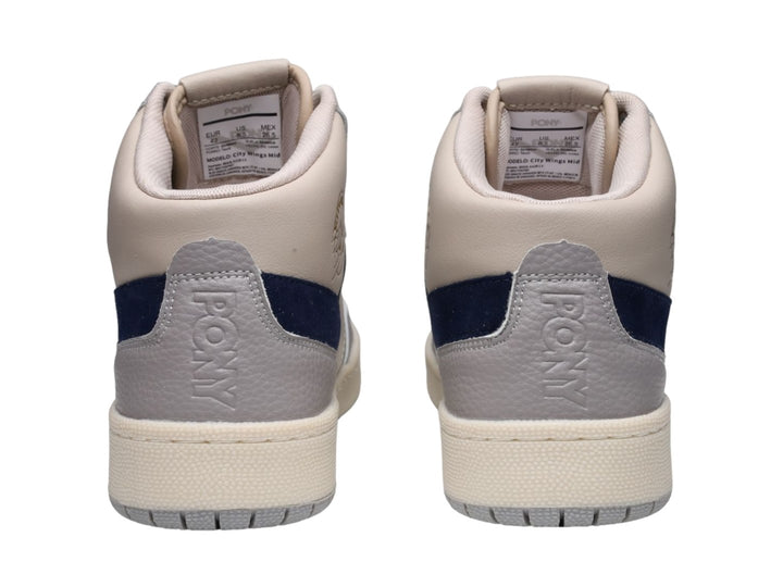 Tenis PONY City Wings Mid color beige con detalle en azul marino y suela blanca.