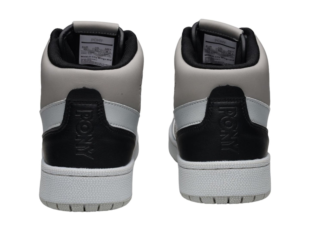 Tenis PONY City Wings Mid color gris con detalles en negro y suela blanca.