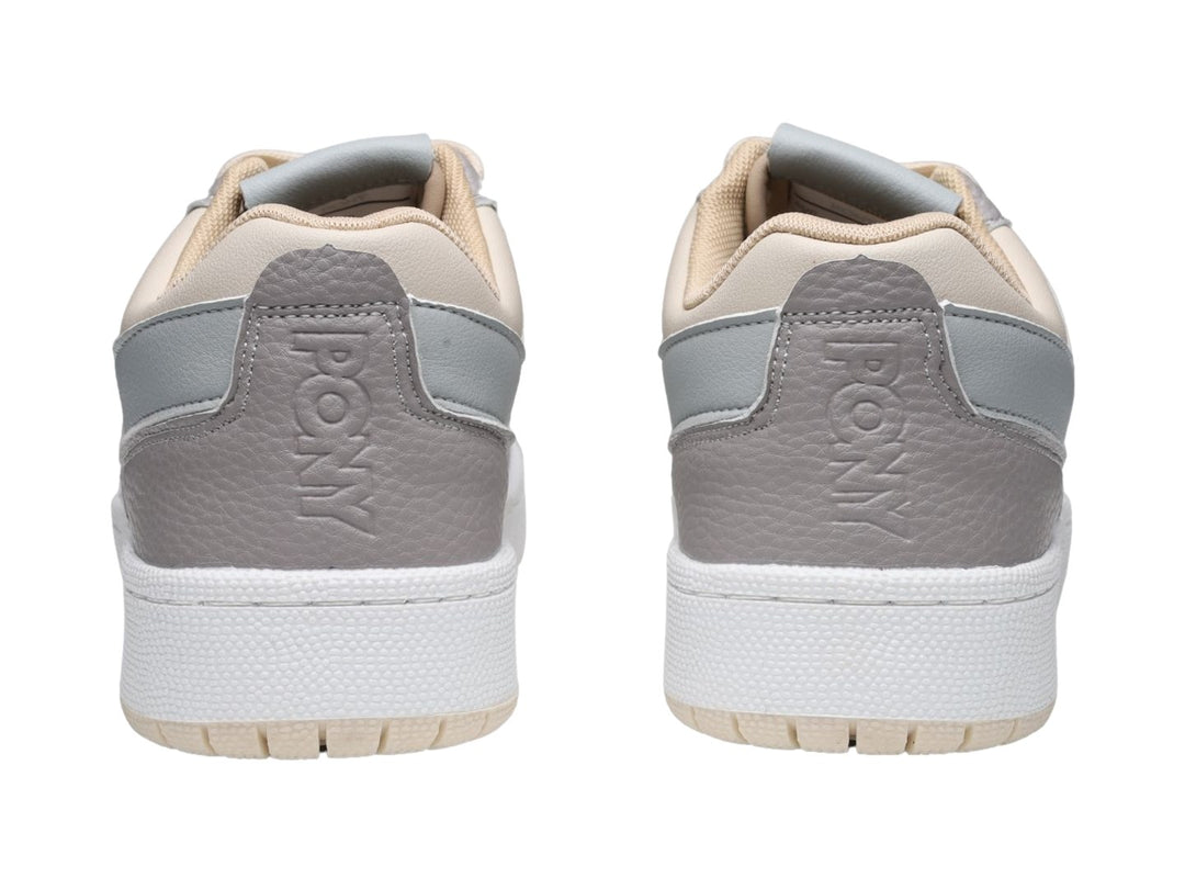 Tenis PONY City Wings en colores gris y beige con suela blanca.