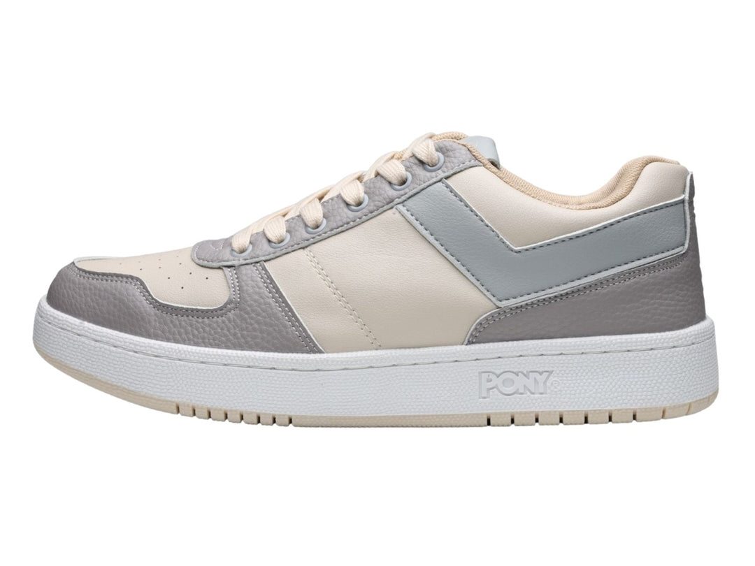 Tenis PONY City Wings en colores gris y beige con suela blanca.
