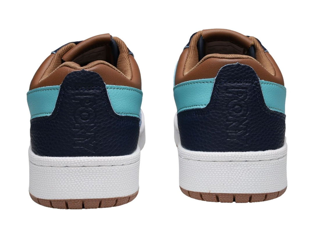 Tenis PONY City Wings color azul marino con franja azul claro y detalles café, suela blanca.