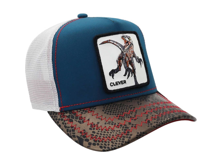 Gorra Goorin Bros azul y gris con estampado de piel de reptil y parche de dinosaurio.