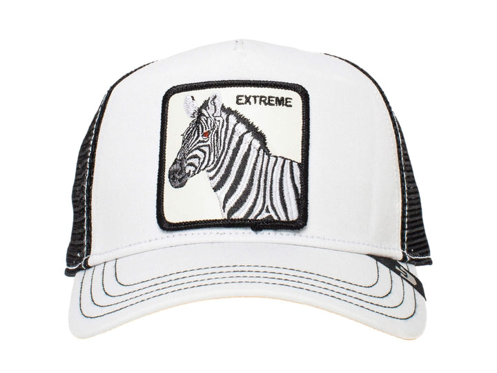 Gorra blanca Goorin Bros con malla negra y un parche frontal de una cebra con la palabra EXTREME.