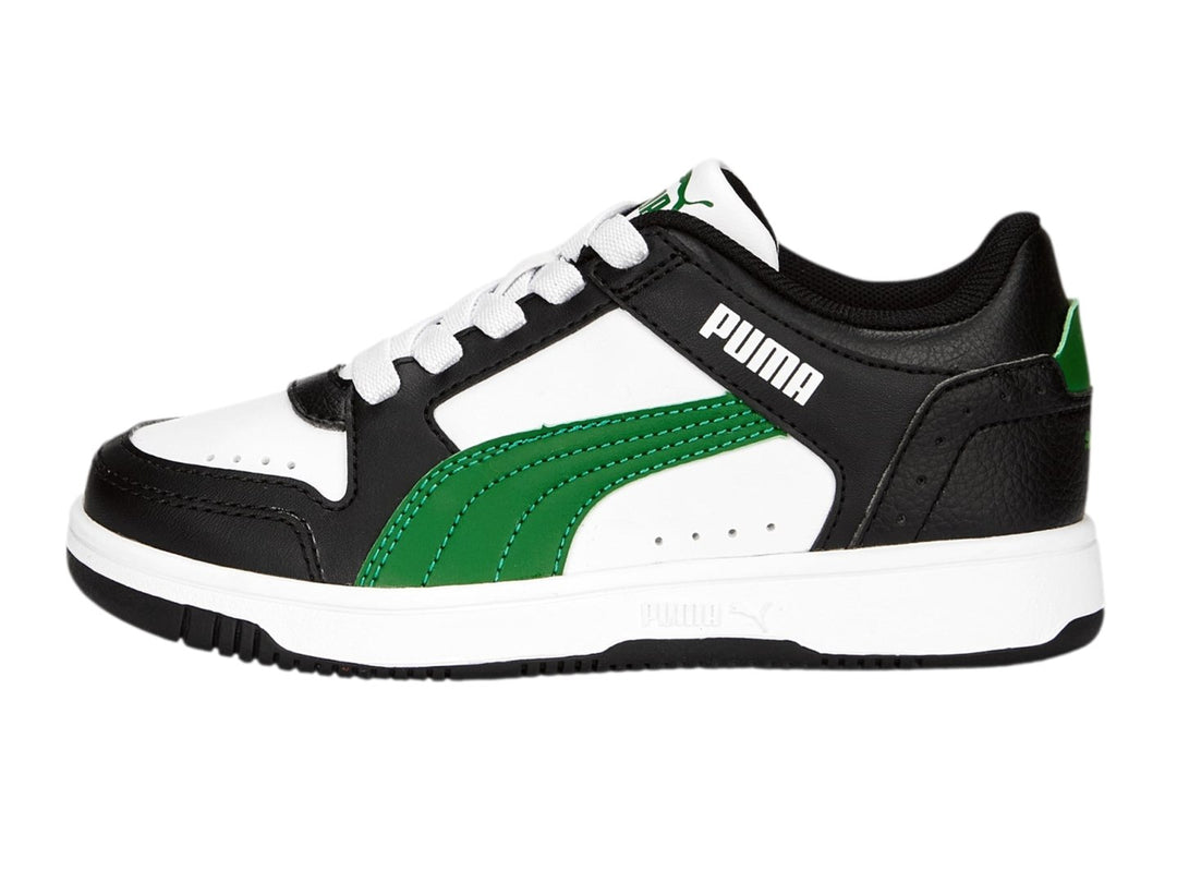 Tenis PUMA Rebound Joy Lo AC PS en colores blanco, negro y verde con suela blanca.