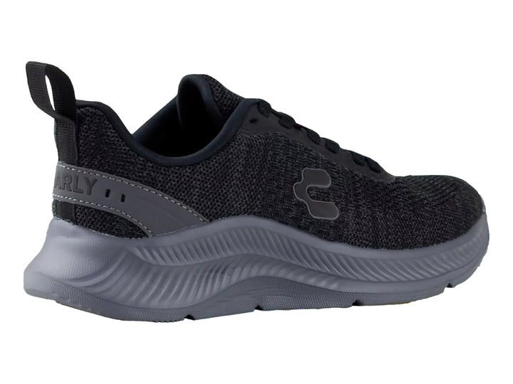 Tenis deportivos Charly en color negro y gris con suela robusta y tejido transpirable.
