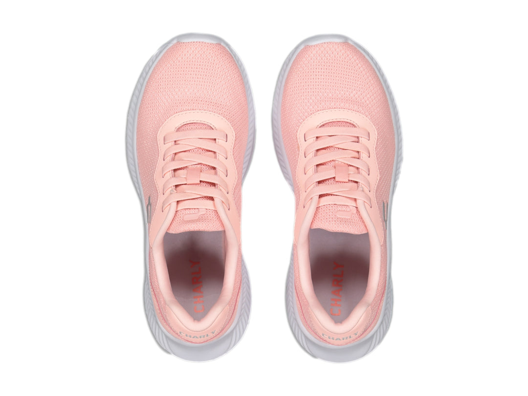 Tenis deportivos Charly de color rosa con suela blanca y tejido de malla.