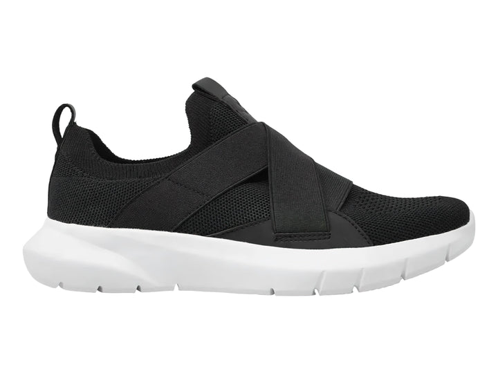 Tenis deportivos Charly en color negro con suela blanca y diseño de bandas elásticas transversales.