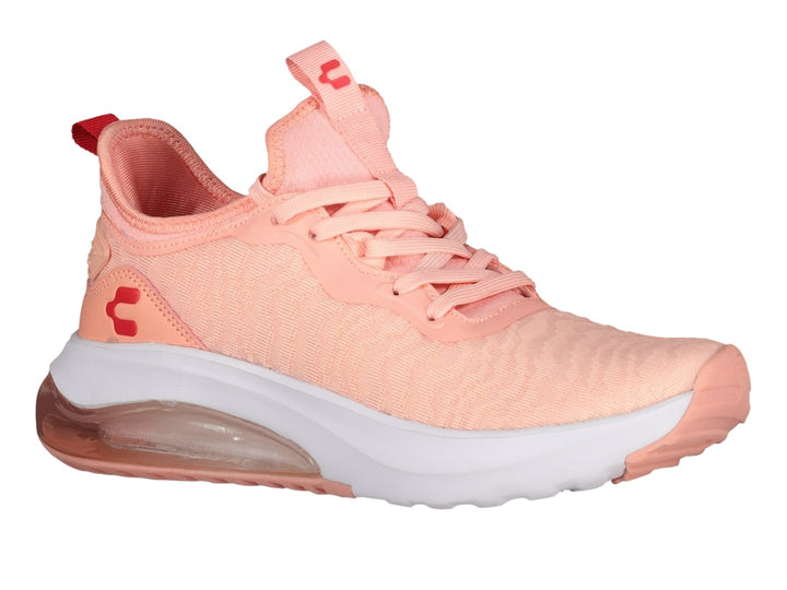 Tenis deportivos Charly en color rosa con suela blanca y cámara de aire visible.