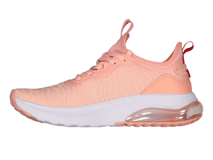 Tenis deportivos Charly en color rosa con suela blanca y cámara de aire visible.