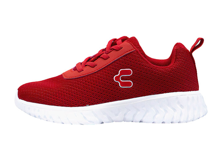 Tenis deportivos Charly en color rojo con suela blanca.