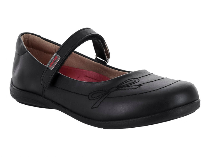 Zapato negro para niña estilo Mary Jane con correa y detalle de moño bordado.