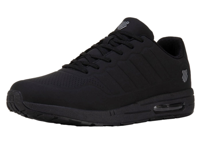 Tenis deportivos K-Swiss color negro monocromático con detalle de amortiguación visible en la suela.