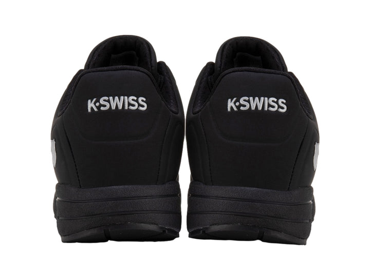 Tenis deportivos K-Swiss color negro monocromático con detalle de amortiguación visible en la suela.