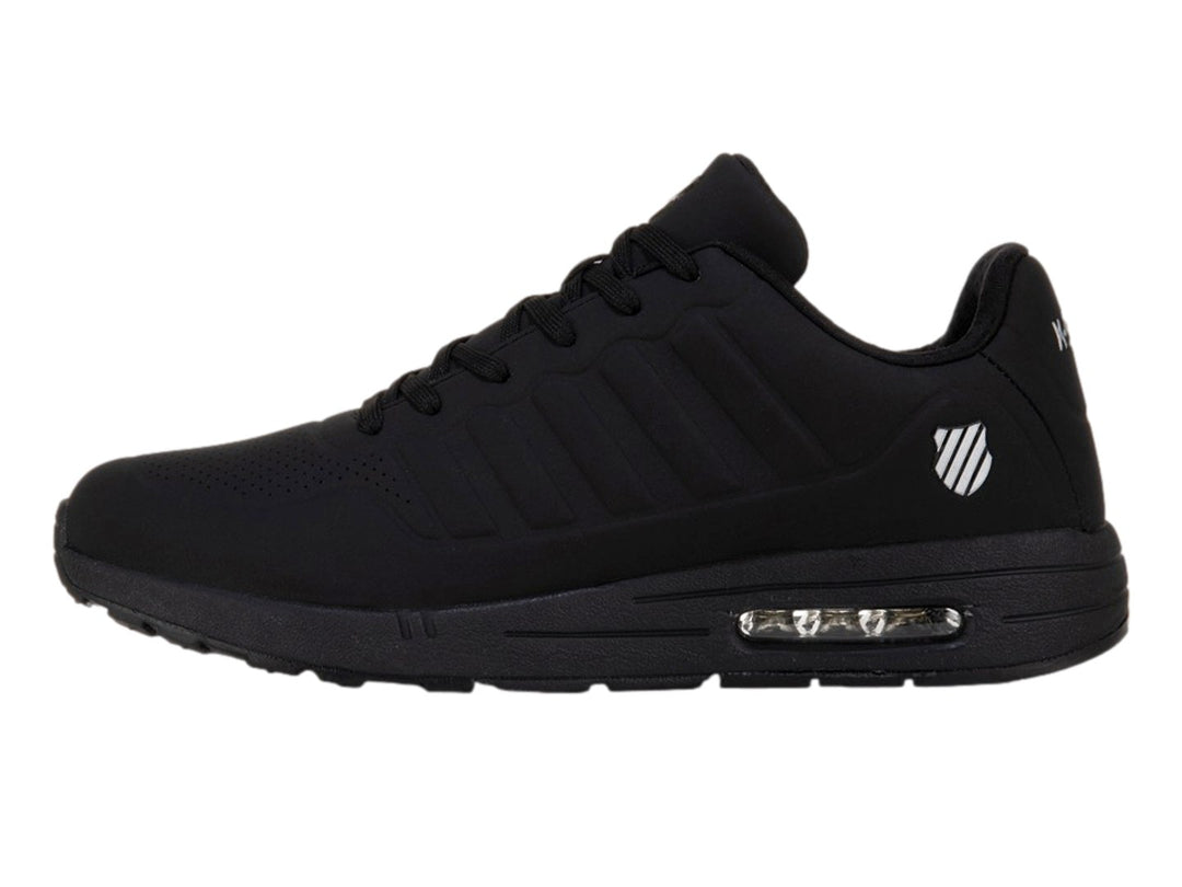 Tenis deportivos K-Swiss color negro monocromático con detalle de amortiguación visible en la suela.