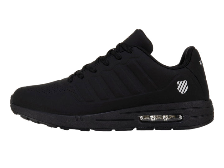 Tenis deportivos K-Swiss color negro monocromático con detalle de amortiguación visible en la suela.