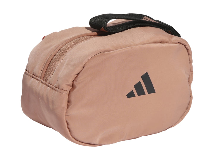 Estuche Adidas color rosa viejo con asa negra y logotipo frontal en color negro.