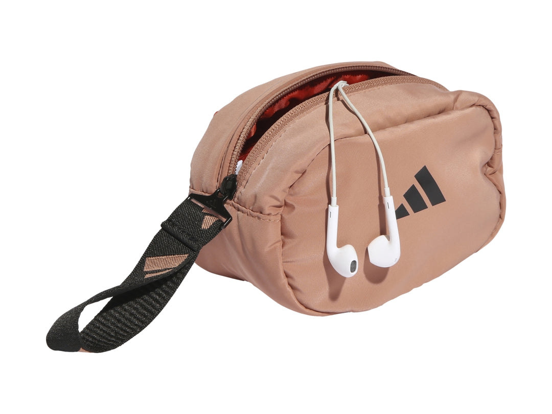 Estuche Adidas color rosa viejo con asa negra y logotipo frontal en color negro.