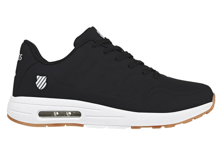 Tenis K-Swiss color negro con suela blanca y detalles en café, diseño deportivo para mujer.