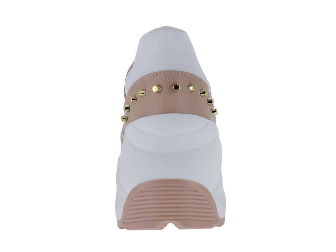 Tenis Westies modelo Pogo en color blanco y nude con detalles metálicos brillantes y suela de plataforma.