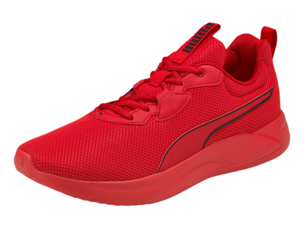 Tenis deportivos PUMA de color rojo intenso con suela a juego y tejido de malla.