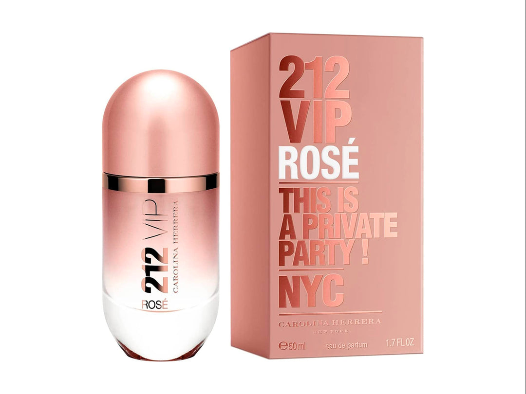 Perfume Carolina Herrera 212 VIP Rosé con su caja en color rosa metálico y botella cilíndrica.