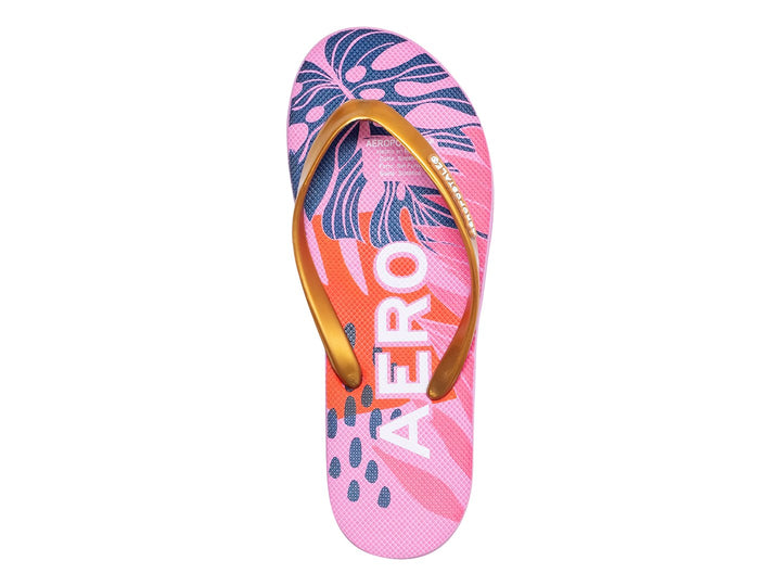 Sandalia de dedo Aeropostale en color rosa claro con tiras doradas y diseño estampado colorido.