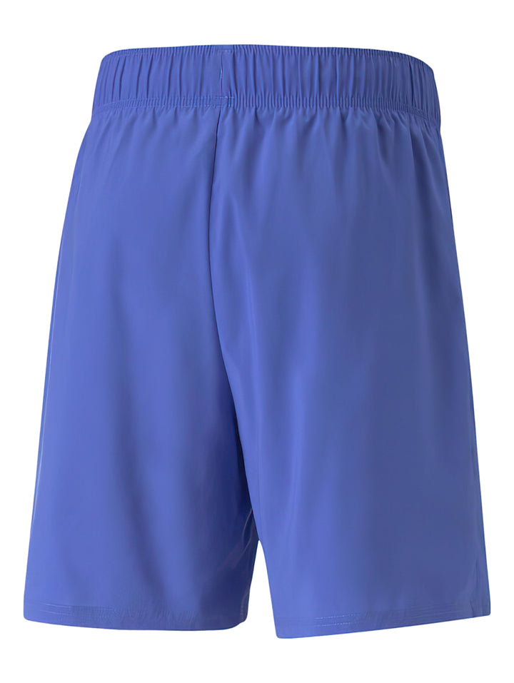 Pantalones cortos deportivos PUMA color azul royal sapphire con cintura elástica.
