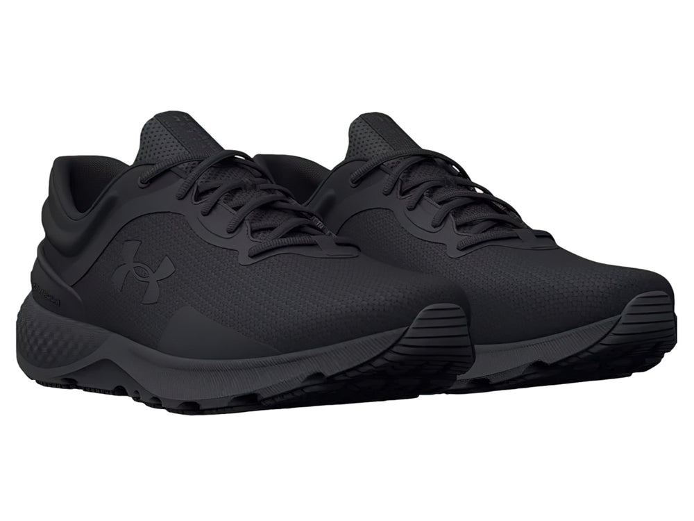 Tenis deportivos Under Armour Charged Escape 4 en color negro, vista lateral.