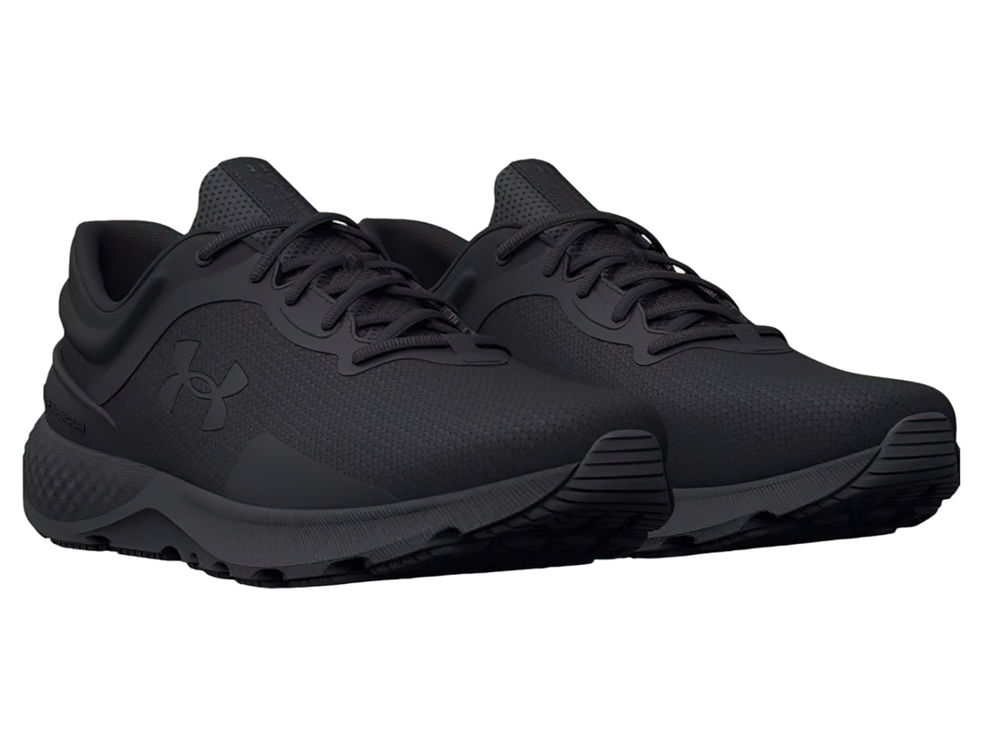 Tenis deportivos Under Armour Charged Escape 4 en color negro, vista lateral.
