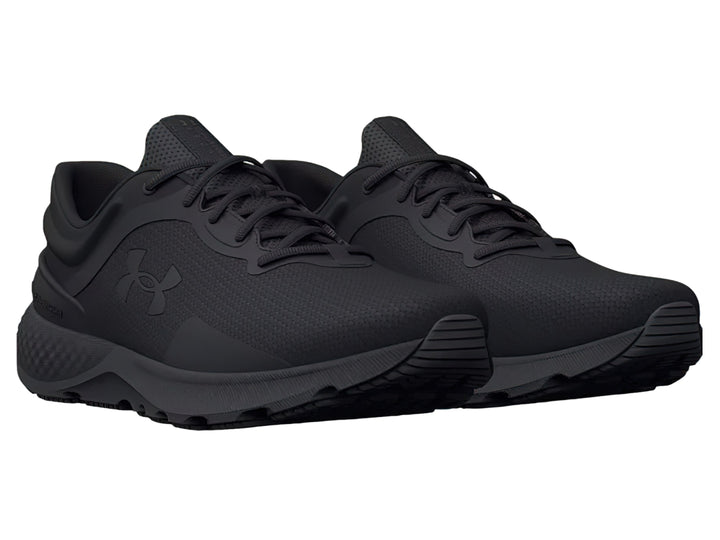Tenis deportivos Under Armour Charged Escape 4 en color negro, vista lateral.