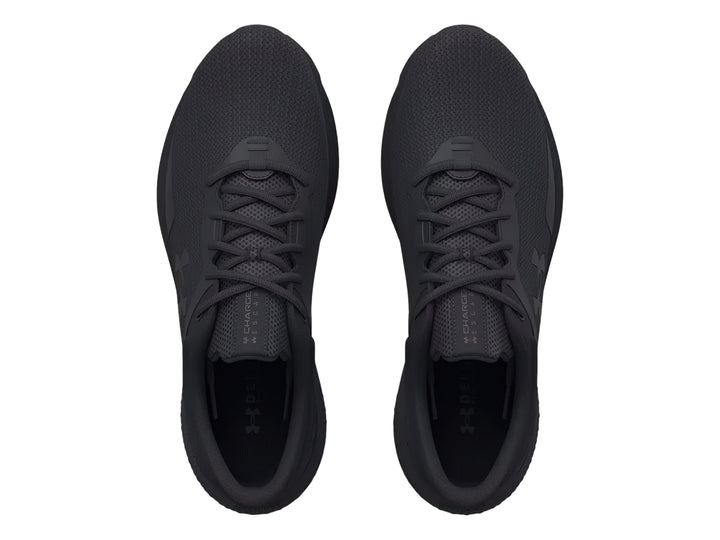 Tenis deportivos Under Armour Charged Escape 4 en color negro, vista lateral.