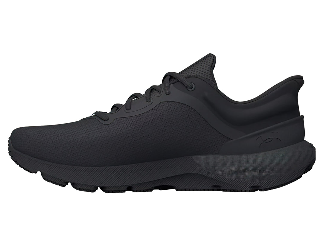 Tenis deportivos Under Armour Charged Escape 4 en color negro, vista lateral.