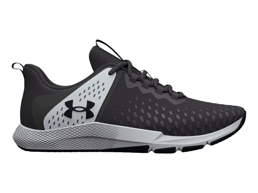 Tenis deportivos Under Armour Charged Engage 2 en color gris y blanco con suela texturizada.