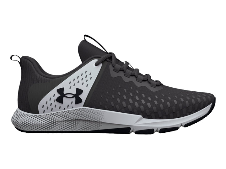 Tenis deportivos Under Armour Charged Engage 2 en color gris y blanco con suela texturizada.