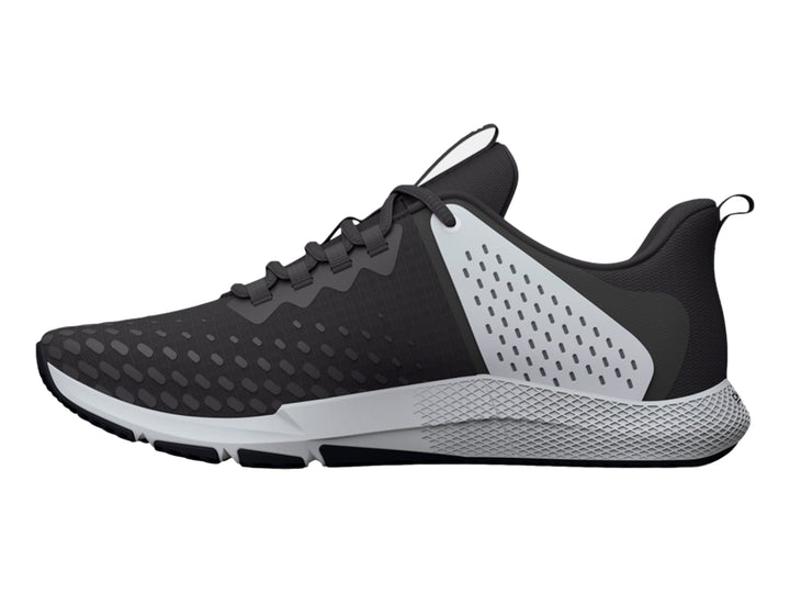 Tenis deportivos Under Armour Charged Engage 2 en color gris y blanco con suela texturizada.