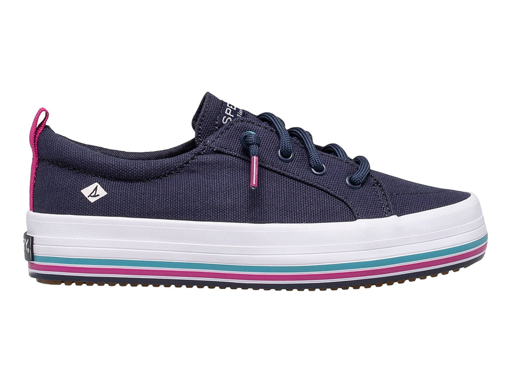 Zapato casual Sperry azul marino con suela blanca y detalles en rosa y turquesa.