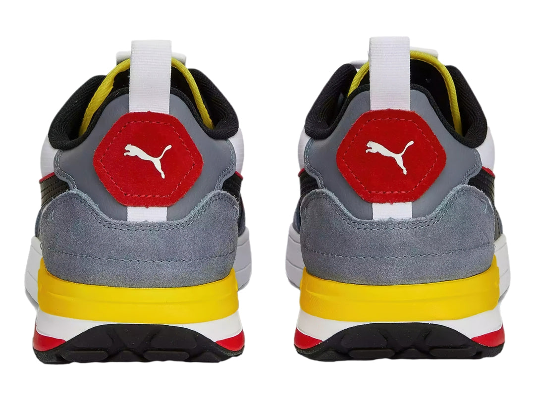 Tenis deportivos Puma R22 en colores gris, blanco, negro, amarillo y rojo, vista lateral.