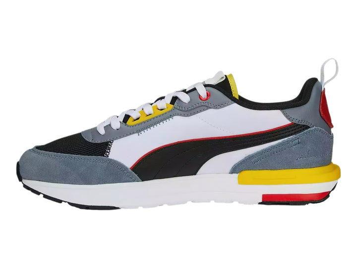 Tenis deportivos Puma R22 en colores gris, blanco, negro, amarillo y rojo, vista lateral.