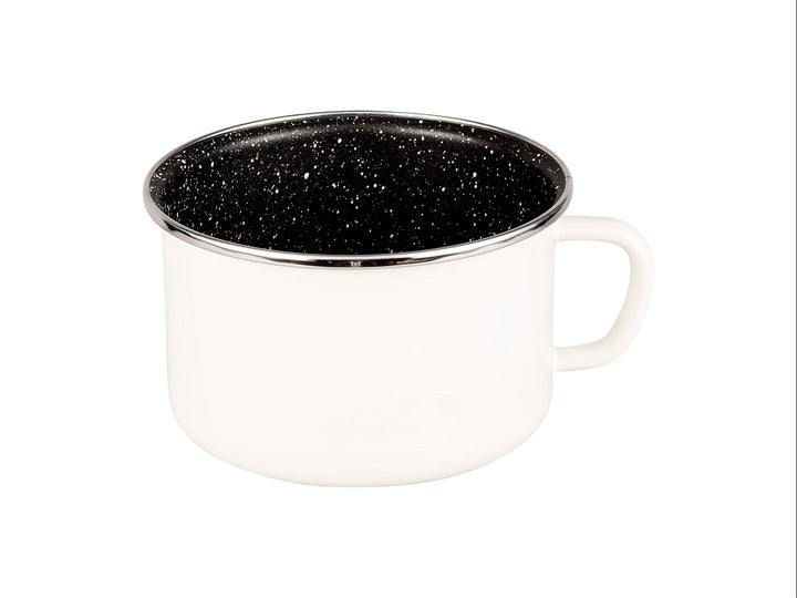Set de batería de cocina Vasconia de 6 piezas en colores blanco y rosa con interior negro moteado.