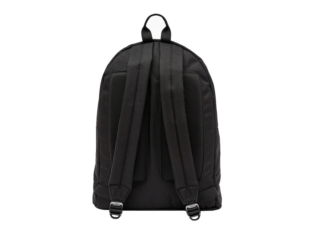 Mochila escolar Lacoste color marino con bolsillo frontal y logotipo del cocodrilo.