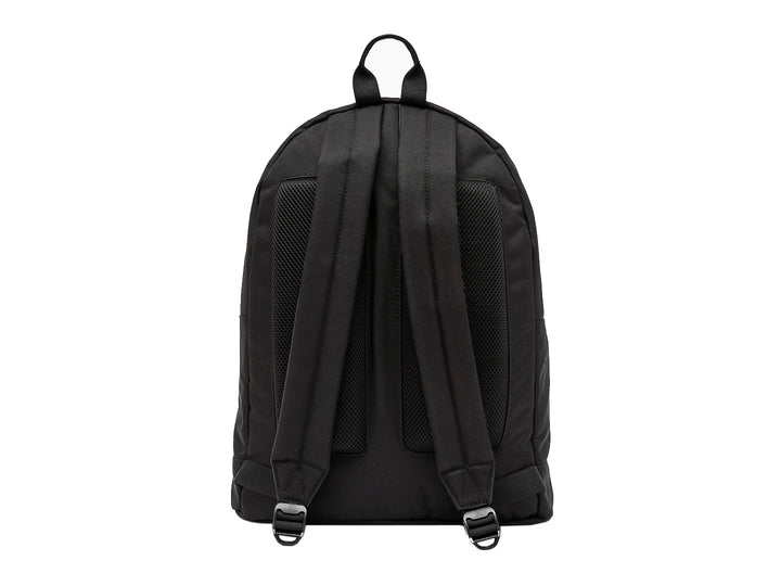Mochila escolar Lacoste color marino con bolsillo frontal y logotipo del cocodrilo.