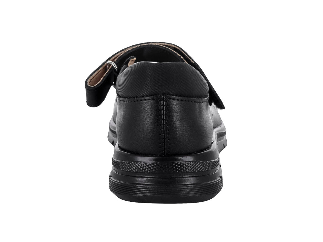 Zapato infantil negro de material napa con correa y detalles de corazones blancos.