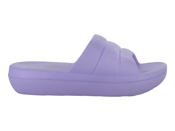 Sandalia deslizante color lila de la marca Isla Flow con suela ancha y diseño minimalista.