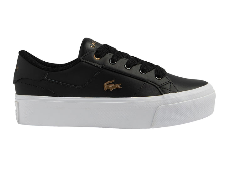 Tenis Lacoste Ziane Platform en color negro con suela blanca ancha y logo dorado lateral.
