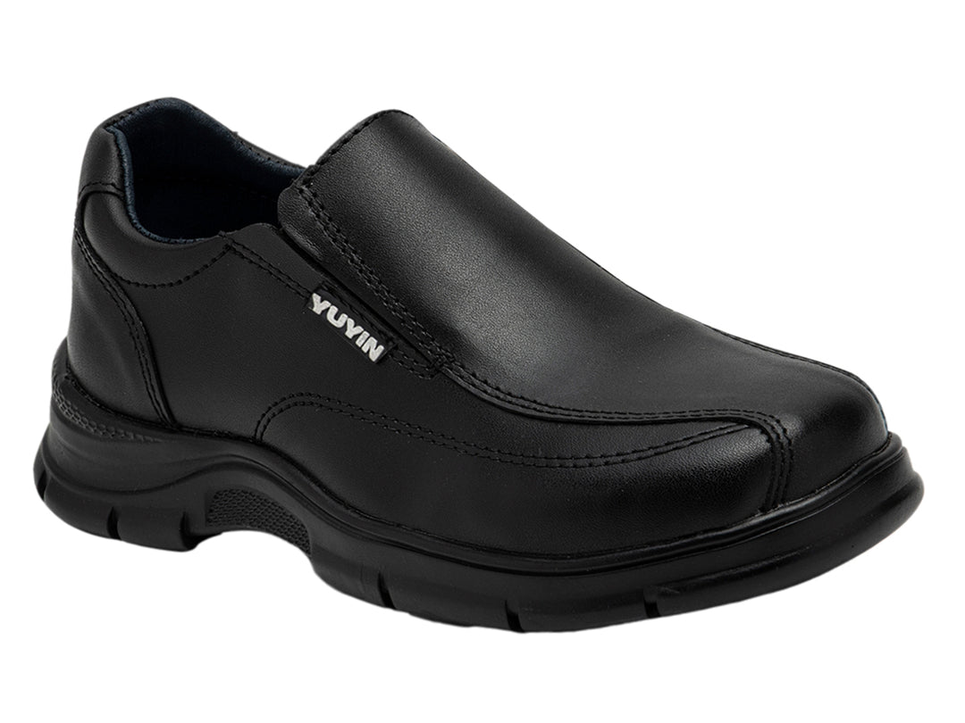 Zapato negro estilo slip-on para niño, material sintético y suela gruesa.