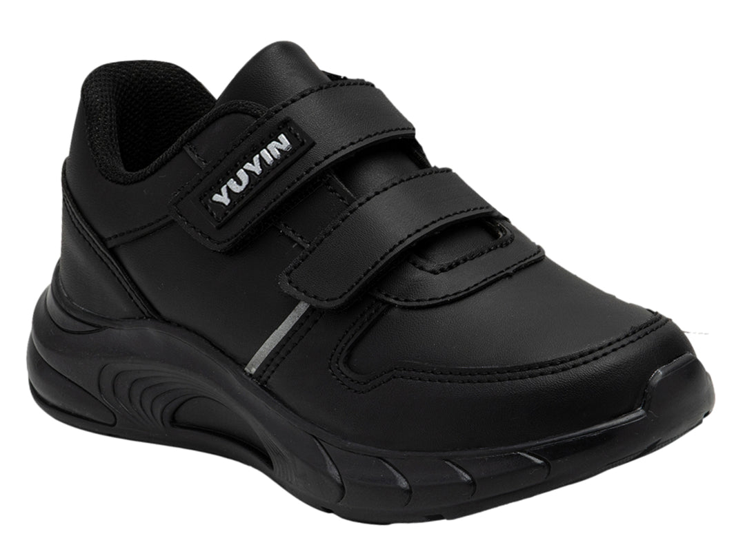 Zapato escolar negro de microfibra para niño con cierre de velcro y suela robusta.